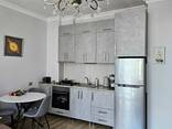 Продается 2-х комнатная квартира 58 кв. м за 180250$ ул. Зураба Горгиладзе 9. #440 - фото 2