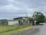 Продается не сельхоз участок и дом на 1 линии в Уреки - фото 1