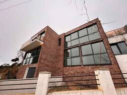 Уникальный таунхаус в лесу с видом на море в Махинджаури